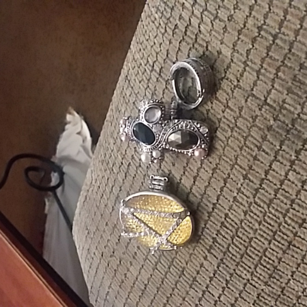 Gold and black and sliver rings